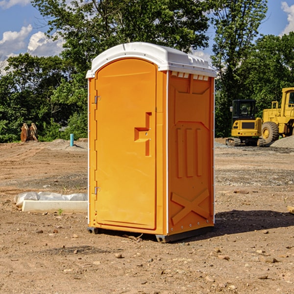 how often are the portable restrooms cleaned and serviced during a rental period in Coulter Iowa